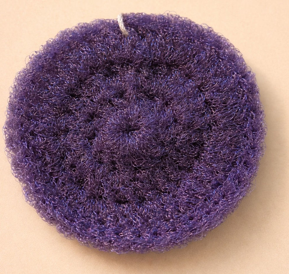 Thumbnail: Round purple heavy duty scrubbie for cleaning