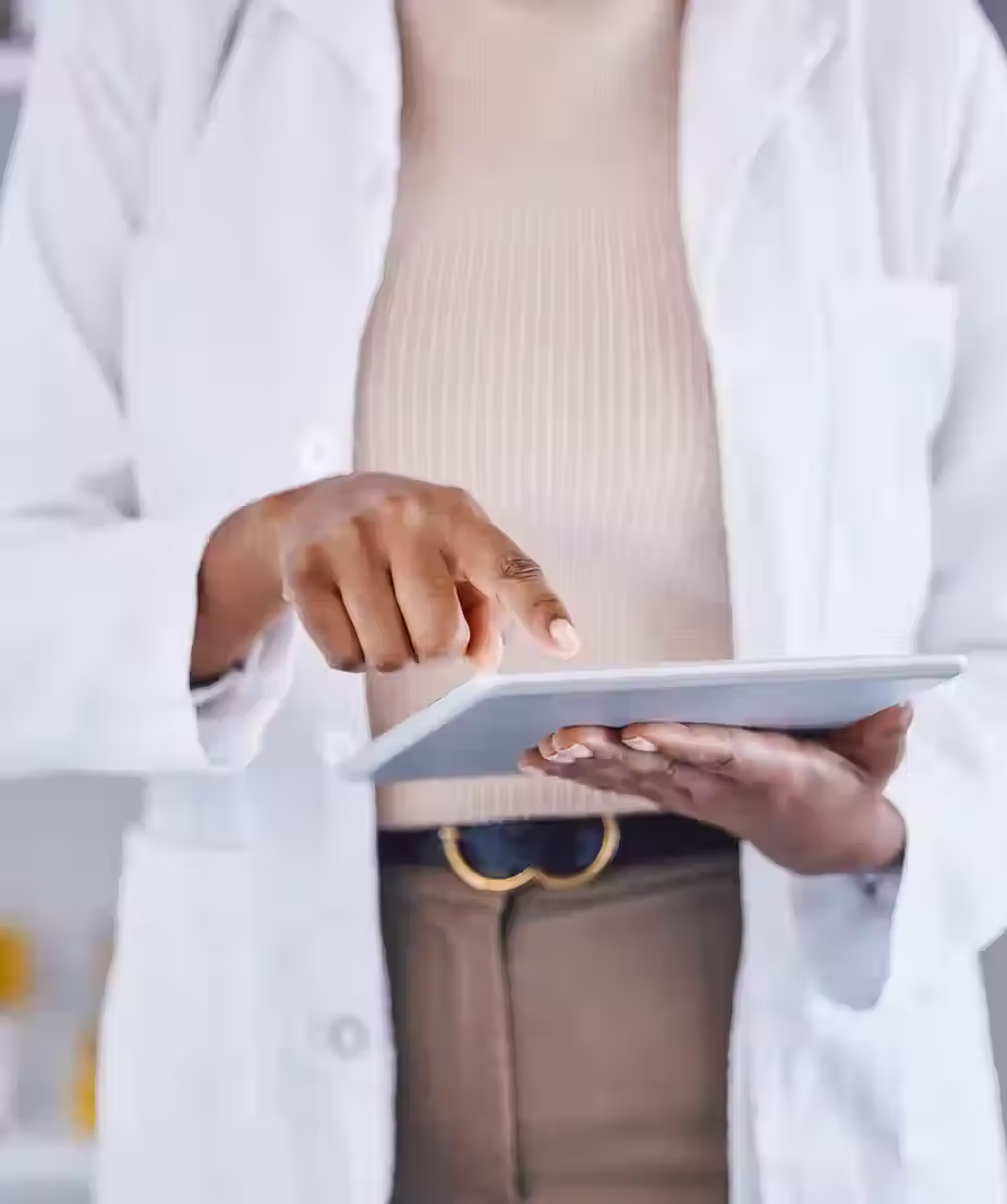 Pharmacist Using Tablet.avif