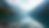 Eye-level view of a serene alpine lake surrounded by towering peaks