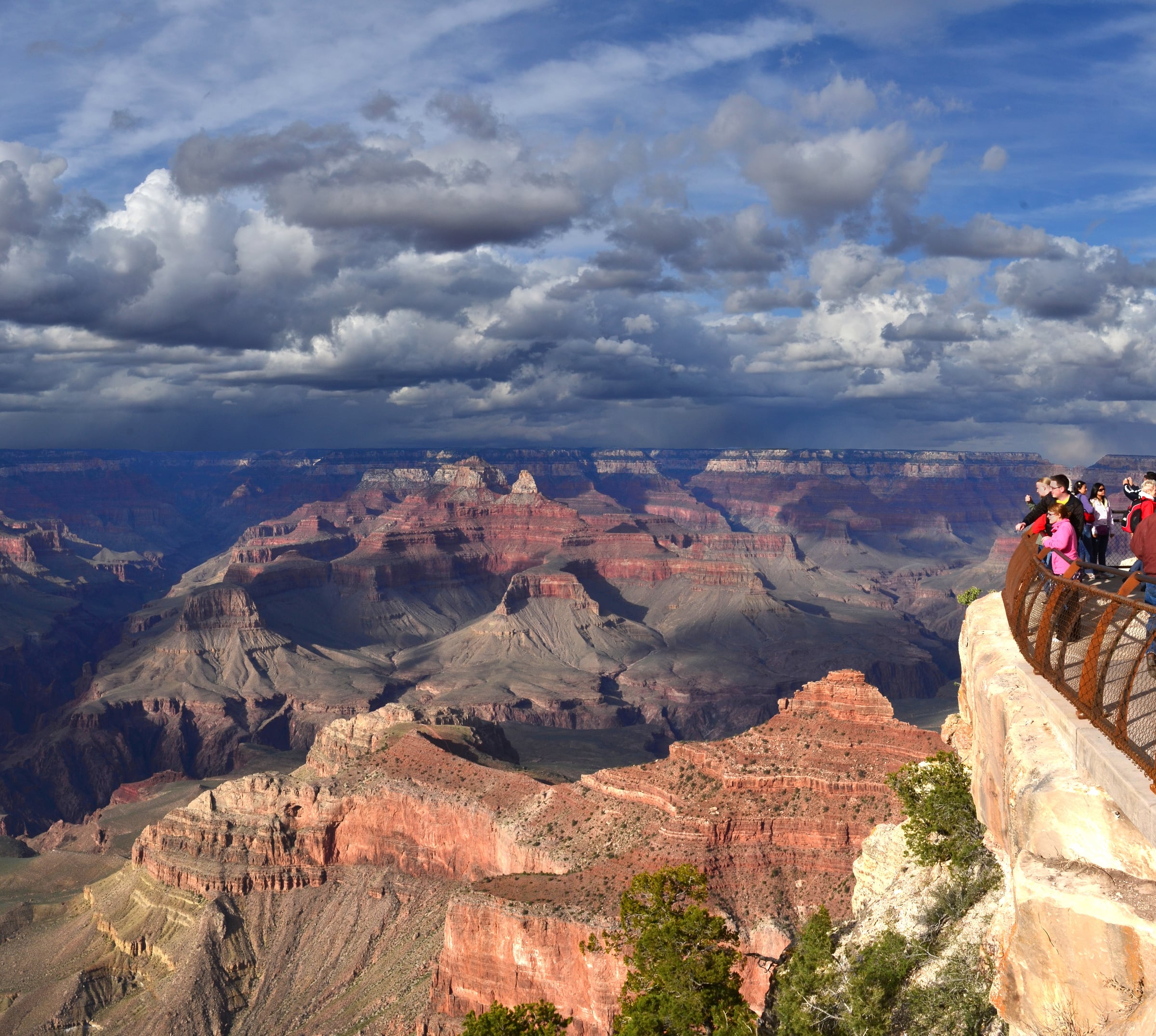 Storm clouds and sunlight over the Grand Canyon from Mather Point on the South Rim.