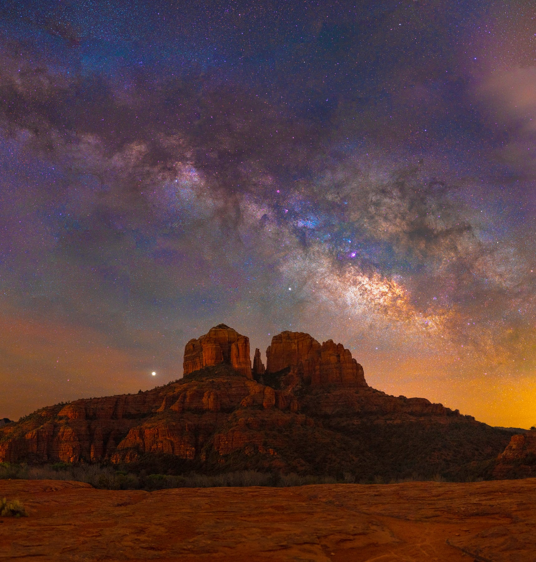 The Milky Way arching above Cathedral Rock in Sedona