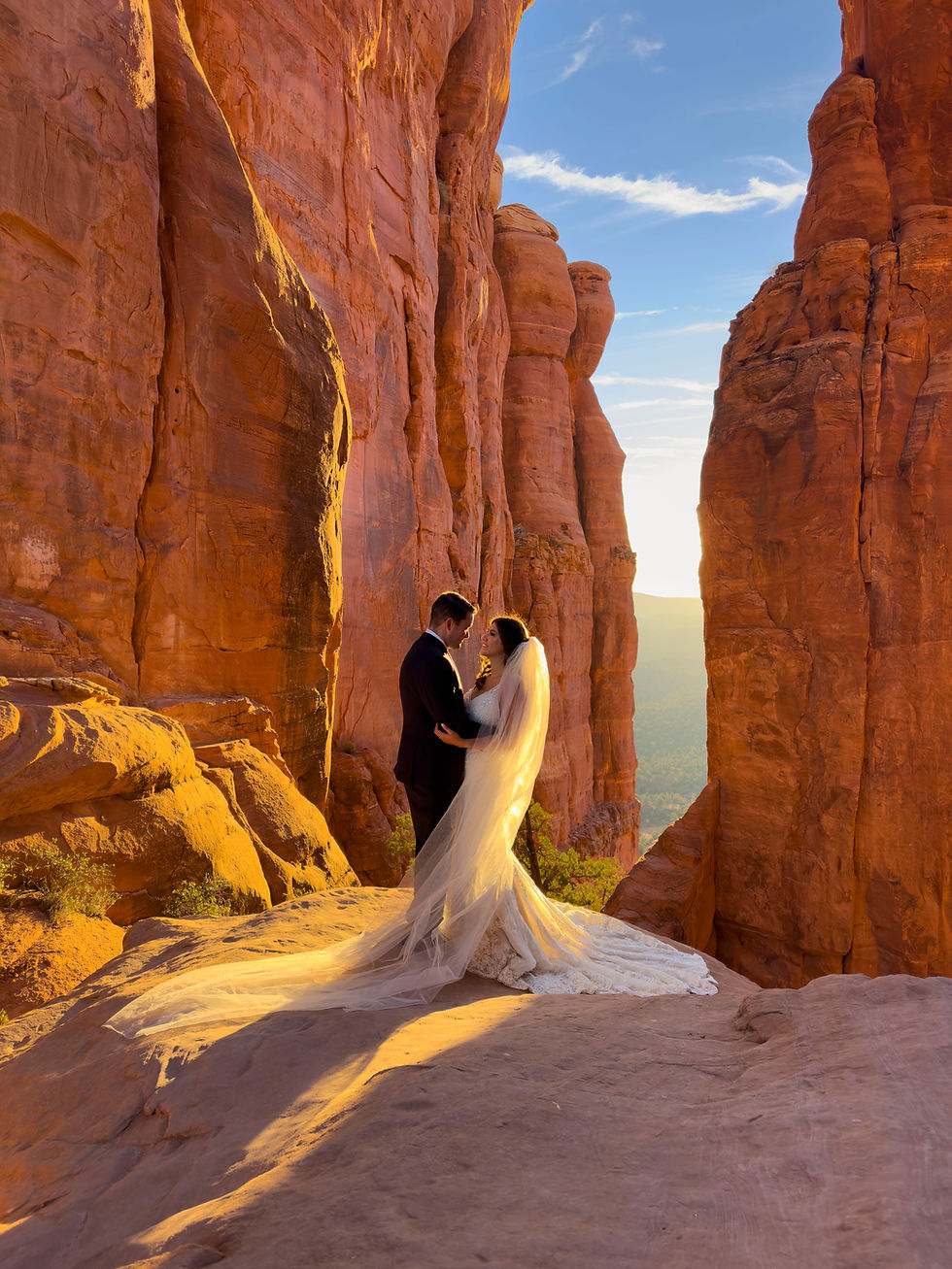 A couple elopes at Cathedral Rock in Sedona, Arizona. Photo by Shannon Roberts for Arizona Photo and Video.