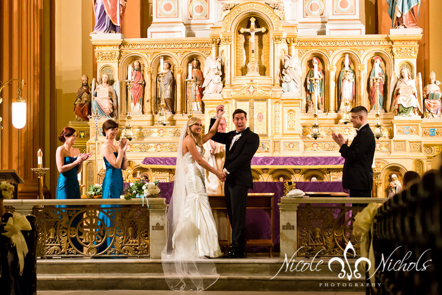 A cheerful end to a beautiful wedding ceremony at St.Mary's Church in New Orleans