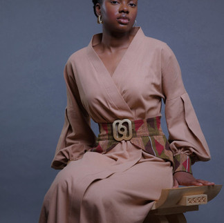 Kimono wrap dress with handwoven Kente and a bold gold-plated buckle engraved with the Nkrabea symbol.