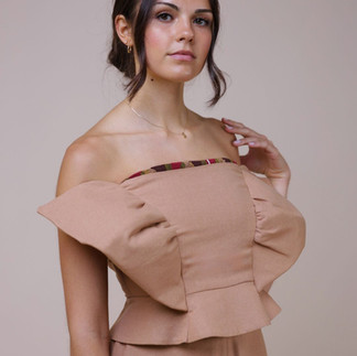 Bustier with peplum and sculpture,  palazzo pants from Ghana kente and linen