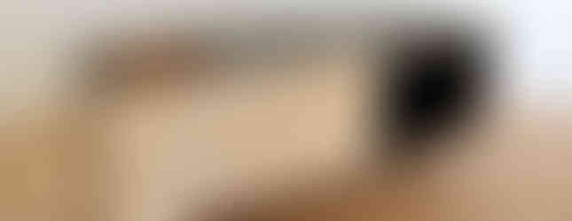 Mini console with transparent black stained cabinet and figured Maple scalloped front panel