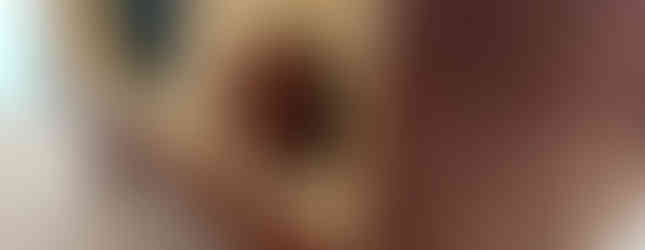 Closeup of bluetooth speaker showing volume knob and detail of splines