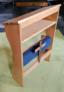 Prayer kneeler with the bench folder upright