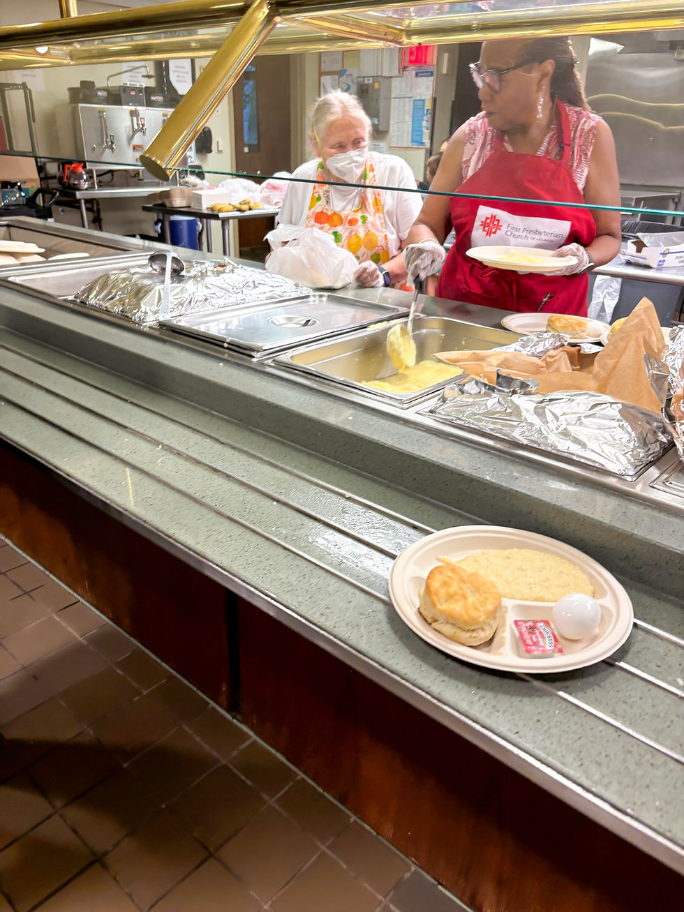 FPC Members serve at Community Ministries Prayer Breakfast.