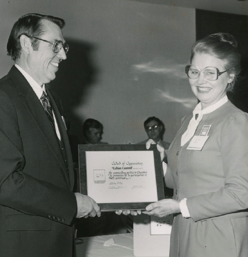 Copeland presents a certificate to Cantrell.