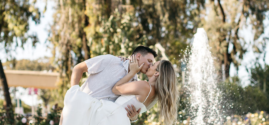 Fountain Engagement Shoot Dip Kiss