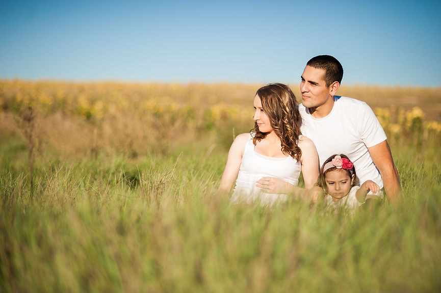 3 person fmily in a wheat field.jpg