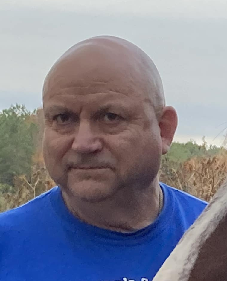 Tim Womack head shot_edited.jpg