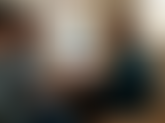 Couple consulting fertility doctor in clinic room