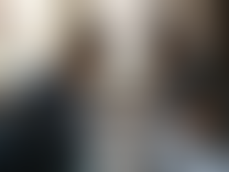 Couple researching IVF options on tablet