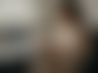 Woman over 40 reviewing fertility booklet in hospital office