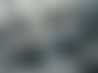 Embryologist and technician analyzing IVF data