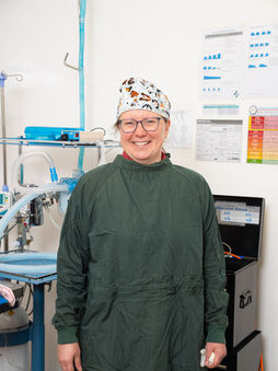 Karen of CVS wearing scrubs in the operating theatre