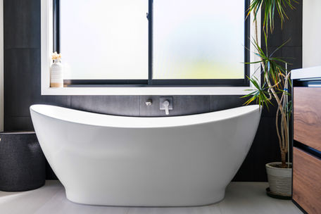Bath tub chosen for style and design elements.