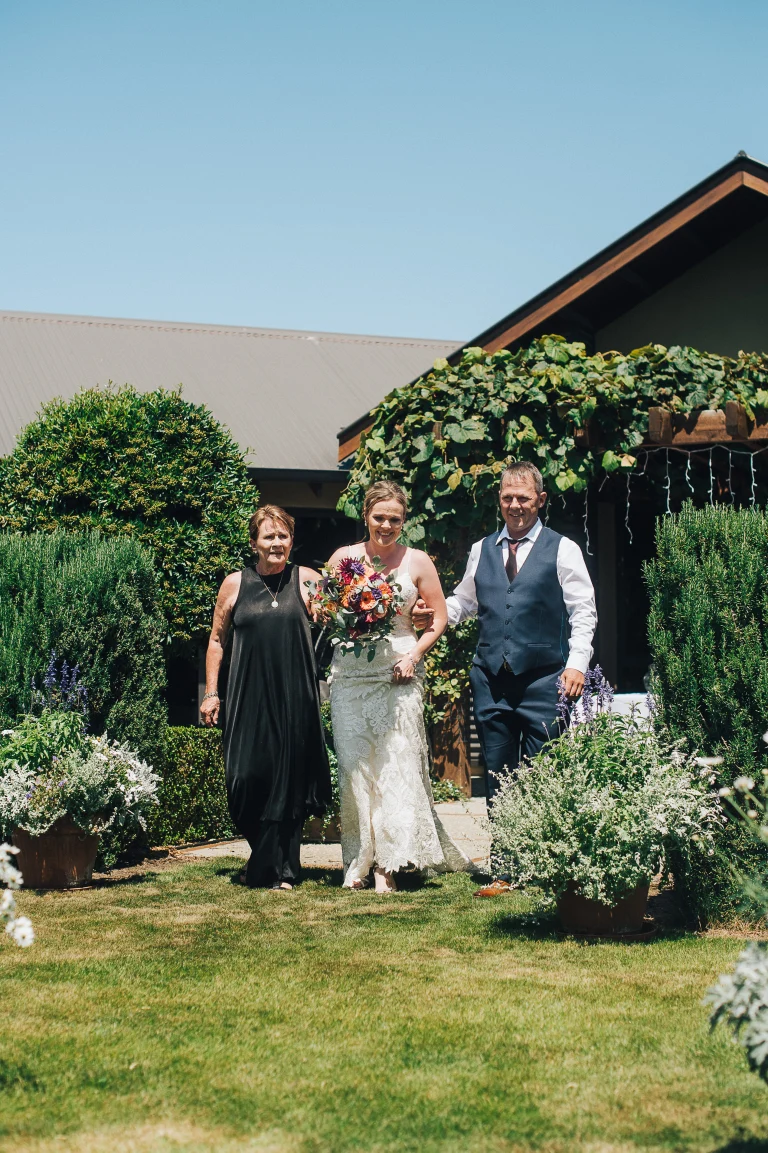 Mum and brother walk the bride down the aisle