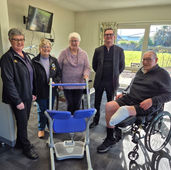 Gore Health CEO, Karl Metzler being presented with a Sara Steady device as a donation from Gore River Valley Lions Club, the Eastern Southland Diabetes Support Group and Alan 'Tiny' Byrne.