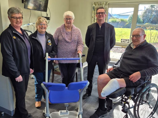 Gore Health CEO, Karl Metzler being presented with a Sara Steady device as a donation from Gore River Valley Lions Club, the Eastern Southland Diabetes Support Group and Alan 'Tiny' Byrne.