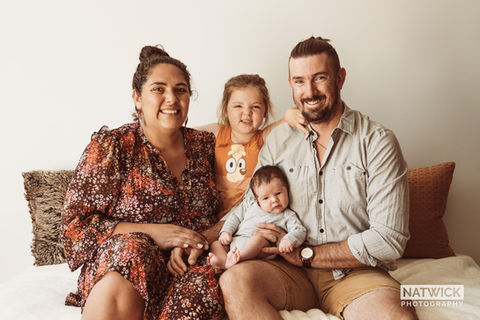 Family of four in Newborn Portrait Shoot with Natwick Photography