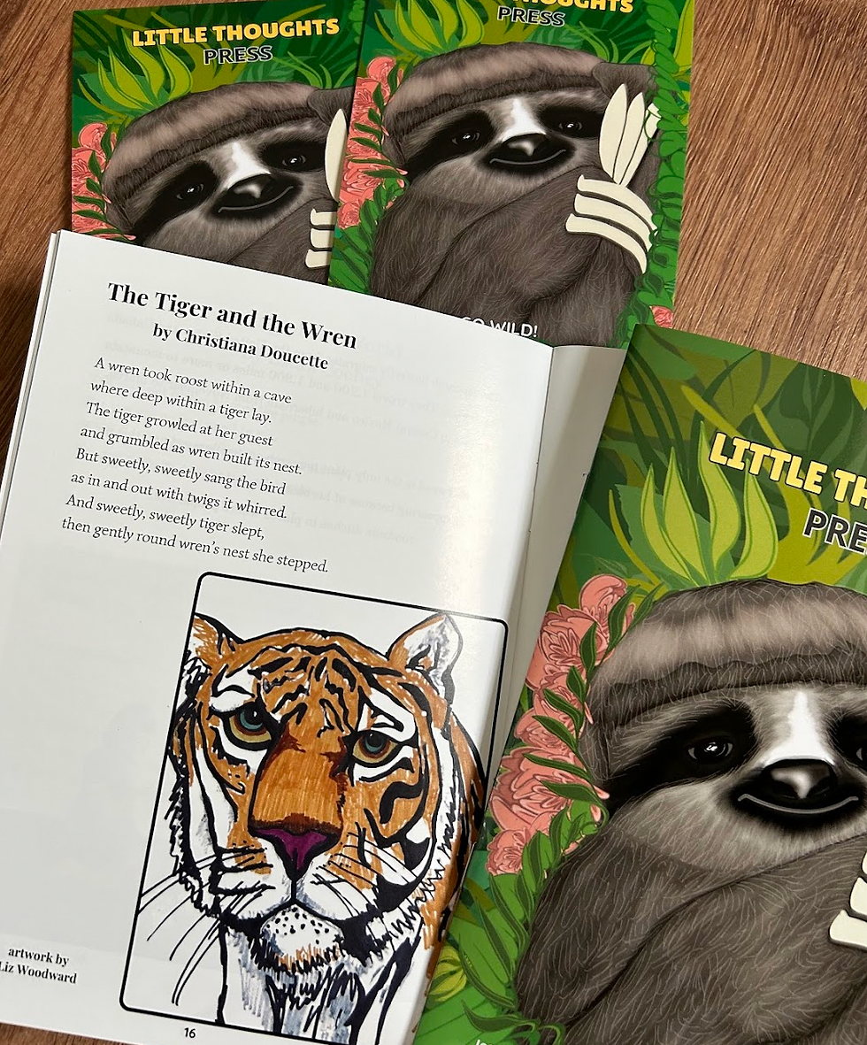 Photo of a copy of Little Thoughts Press Issue 9: Go Wild featuring the poem The Tiger and the Wren by Christiana Doucette and an illustration of a tiger by Liz Woodward