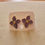 Miniature : Boucles d'oreilles violet foncés florales