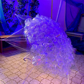 ビニール傘で折られた『RE:』