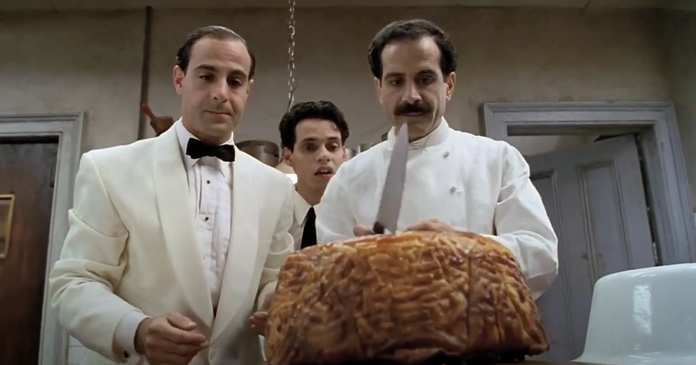 Preparing to cut into the timpano