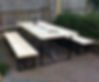Bespoke outdoor dining table and benches made from reclaimed wood and black metal frames, handcrafted in Kent by The Welding Carpenter
