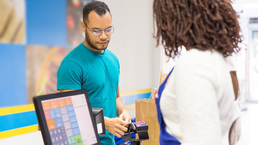 Customer making a card payment at a point-of-sale terminal