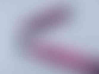 Pink and silver fountain pen cap with a wavy pattern on a white background. Text "Zoom M-1000" and "MODEL 1000K" visible on silver clip. Noodler's Ahab fountain pen review.