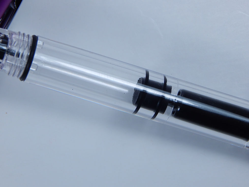 Thumbnail: Transparent polycarbonate barrel of the MP1 pen filled with purple ink
