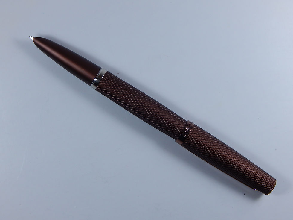Thumbnail: Capped Diplomat Viper Brown fountain pen on a mahogany desk