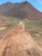 Roads are either broken or corrugated like a washboard.