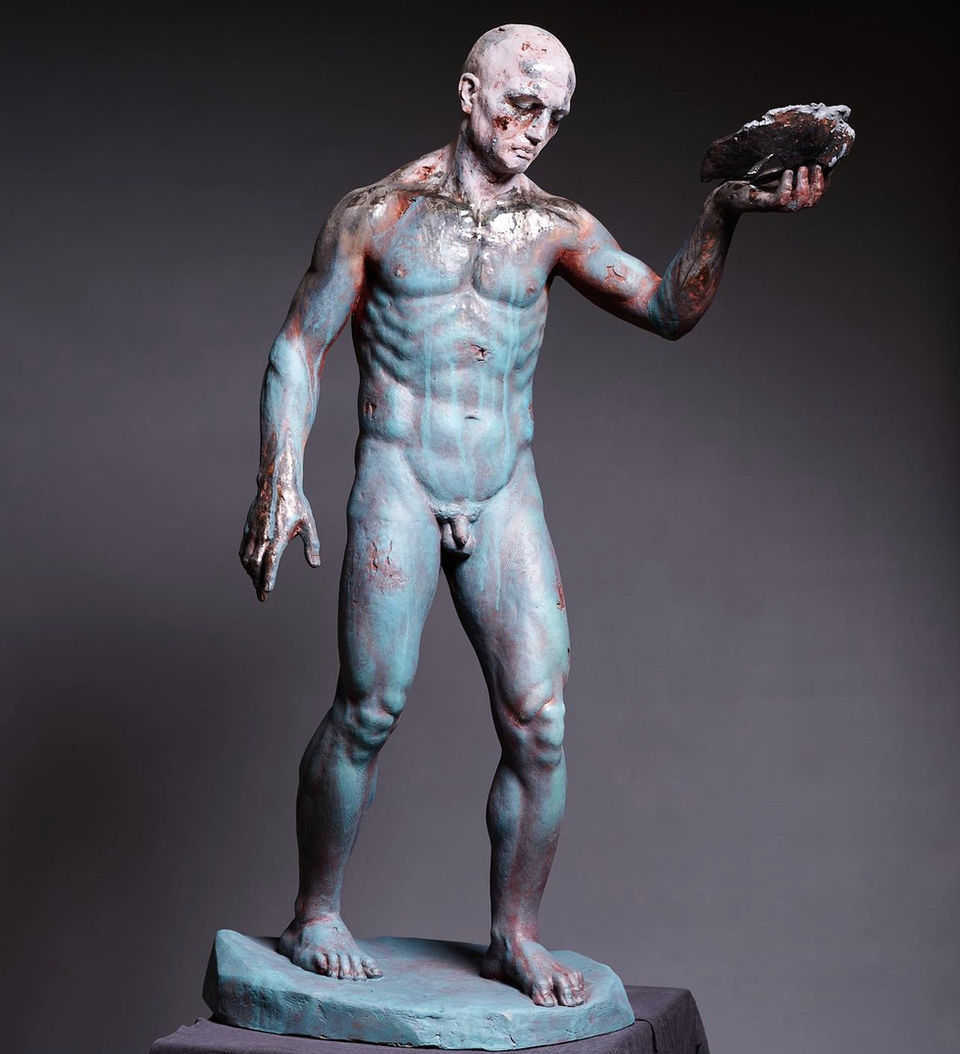 Figurative sculpture of a naked soldier