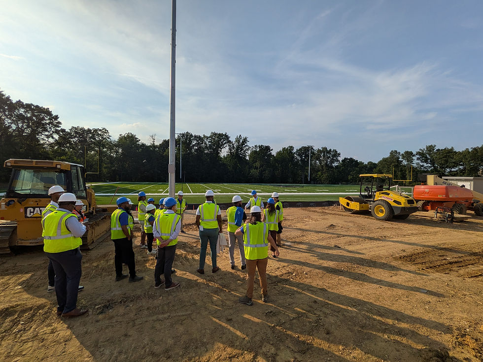 Jeff Breslin leads BGCMB’s Board of Directors on a post-meeting tour of the Ravens Club following the July board session.