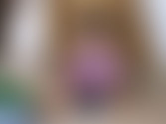 Toddler drawing with a caregiver — illustrating steps to Prepare Your 2-Year-Old for their first day at daycare in Pembroke Pines.