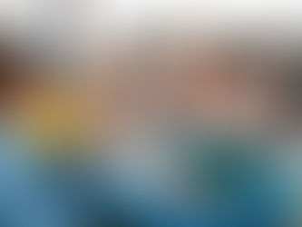 Teacher showing number cards to young children during a learning activity, representing quality Daycares for 3-Year-Olds in Pembroke Pines focused on early education.