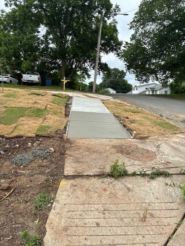 Close-up of freshly finished concrete with smooth edges and clean joint lines in Central Arkansas
