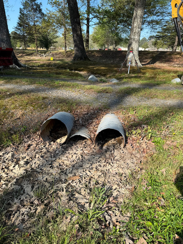 Failed culvert before excavation and repair in North Little Rock AR — Hyslip Excavation