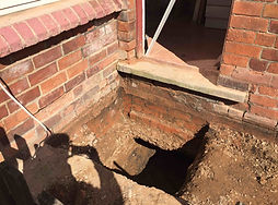 underpinning under subsidence damaged wall