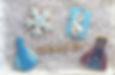 High angle view of a variety of themed cookies on a decorative plate