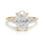 Oval diamond ring with pear side stones