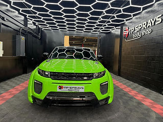 Green car after professional paint and respray service