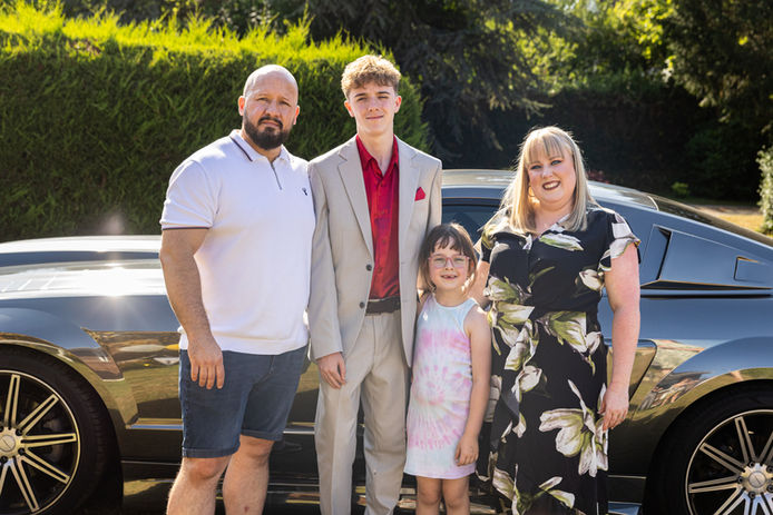 family attending a wedding 