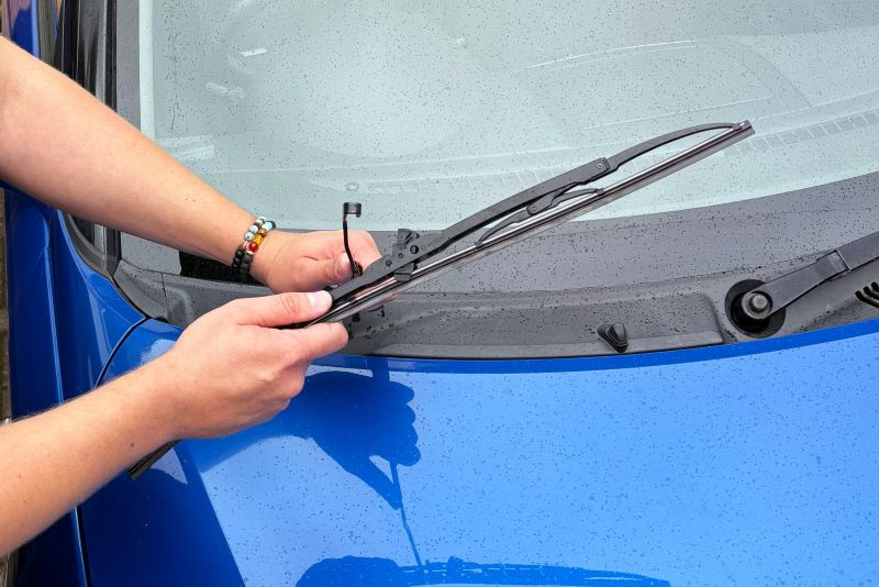 Wiper blade being replaced