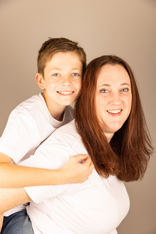 son on his mothers back 